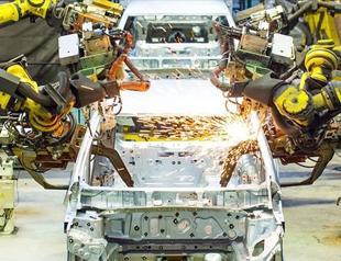 Manufacturing capacity usage edges down in Feb