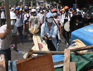 Shots, tear gas as police in Myanmar intensify use of force