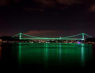 Istanbul’s Bridges illuminated in green