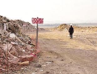 Workers search for personal belongings under rubble of buildings destroyed in İzmir quake