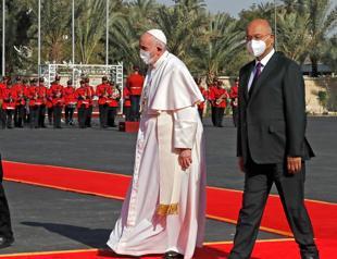 Pope Francis happy to land in Iraq on historic visit