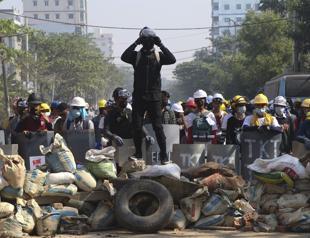 Myanmar protesters rally after overnight raids on opposition figures