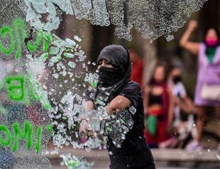 Women march in Mexico to make their voices heard, seek justice