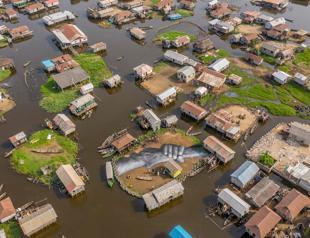 Giant fresco appears in floating Benin village