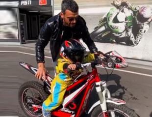 Motorcyclist champ faces criticism for filming his 2-year-old son riding motorbike