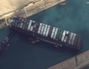 Suez Canal remains blocked amid efforts to free stuck vessel