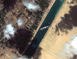 Ship blocking Suez Canal moves slightly, unclear when it will refloat