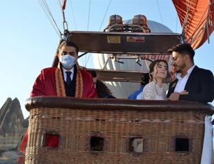 Couple weds in hot air balloon flying over Cappadocia