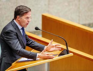 Dutch PM Rutte clings on after political battle