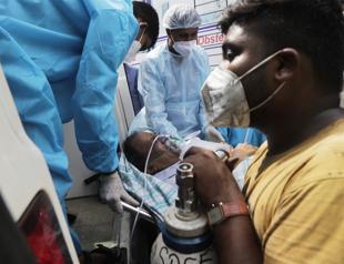 Record infections overwhelm India’s hospitals
