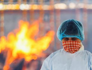 Indias crematoriums overwhelmed as virus swallows people