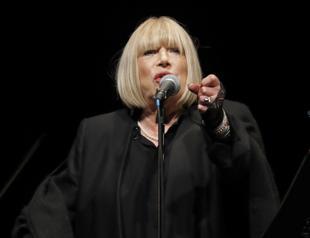 Iconic artist turns to poetry as COVID-19 robs her of song