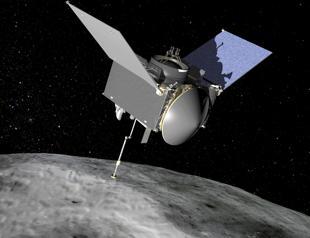 NASA spacecraft begins 2-year trip home with asteroid rubble