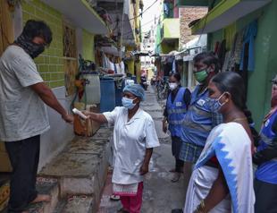 India coronavirus death toll passes 250,000, variant spreads