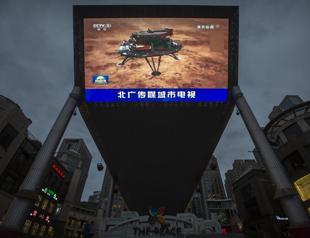 China’s rover touches down on Mars