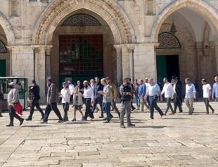 Scores of Israeli settlers force their way into Al-Aqsa