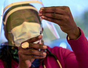 South Africa steps up virus curbs against third wave