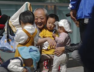 China allows couples to have three children as birthrate falls