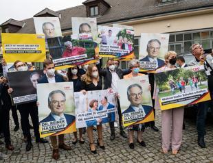 Momentum with Merkel party after victory in key state poll