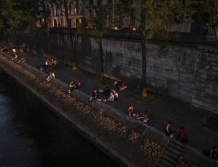 France ditches masks but virus cases surge in Africa