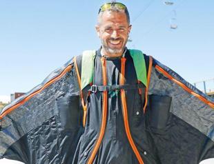 Official dons wingsuit every day to get home