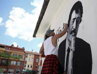Local artist paints portraits of Turkish movie stars across city