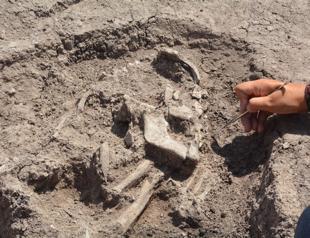 Some 8,500-year-old human skeletons found in apartment yard