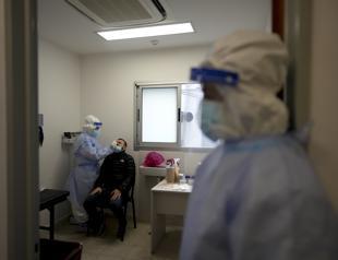 Pfizer pushes for 3rd shot as variant drives global outbreaks