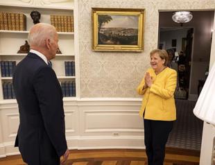 Biden bids Merkel farewell: Friends - with disagreements