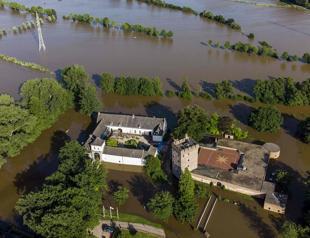 Merkel visits flood zone as western Europe death toll tops 180