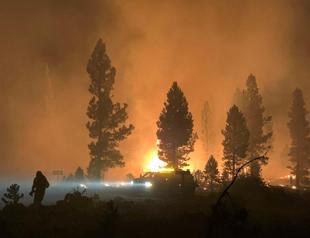 Major US wildfire grows, forcing new evacuations