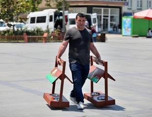 Recycled blackboards become pet feeders