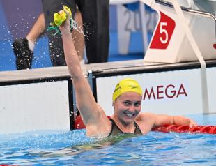 Titmus wins duel in the pool as Dressel launches Olympic gold rush