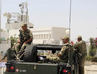 Tunisia president sacks defense minister amid political turmoil