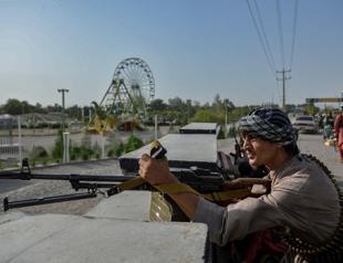 Afghan forces battle to thwart Taliban assaults on key cities