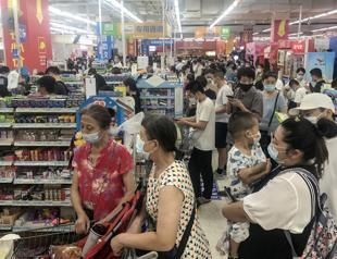 Chinas Wuhan to test all residents as COVID returns