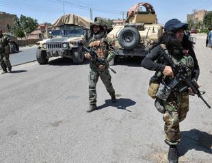 Taliban warn of more targeted attacks as Afghan forces defend besieged cities