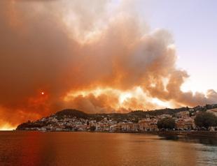 Flames surround island monastery as fires rage in Greece
