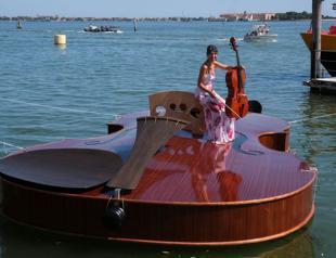In Italy, floating fiddle makes test voyage