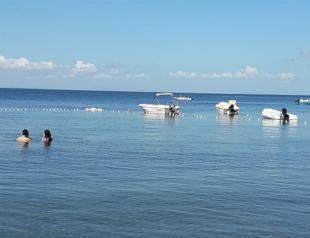 Woman dies after being hit by speedboat