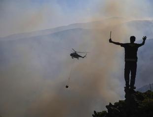 All but two forest fires in Turkey under control