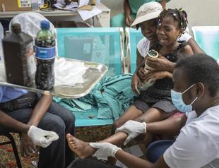 Desperate search after Haiti quake as storm threatens