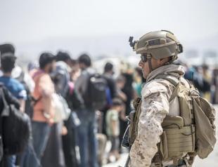 US troops surge evacuations out of Kabul but threats persist