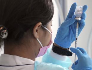 Japan stops use of 1.63 mln Moderna doses over contamination