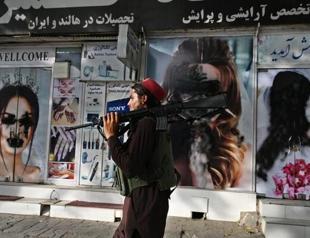 Taliban remove images of women from walls in Kabul