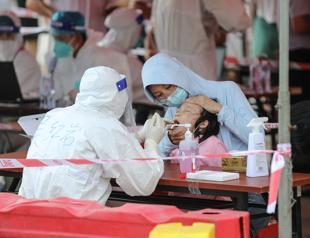 China races to squash new COVID-19 cluster among schoolchildren