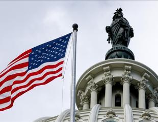 US Congress votes to avert government shutdown at midnight