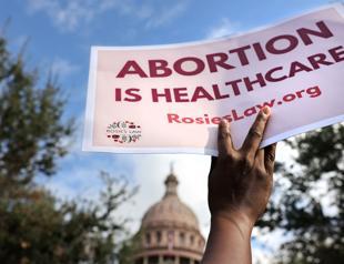 Judge orders Texas to suspend new law banning most abortions