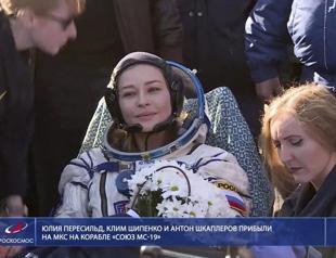 Russian filmmakers land after shoot aboard space station