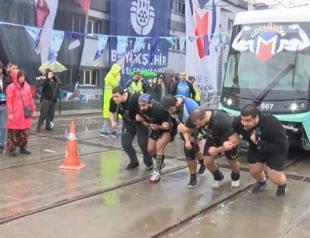 Istanbul metro employees pull 47-ton train as part of competition